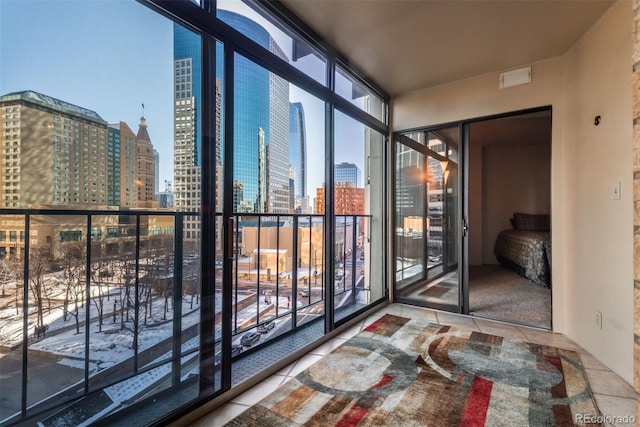 interior space featuring tile patterned flooring and expansive windows