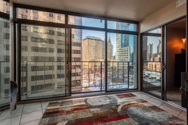 doorway to outside with expansive windows