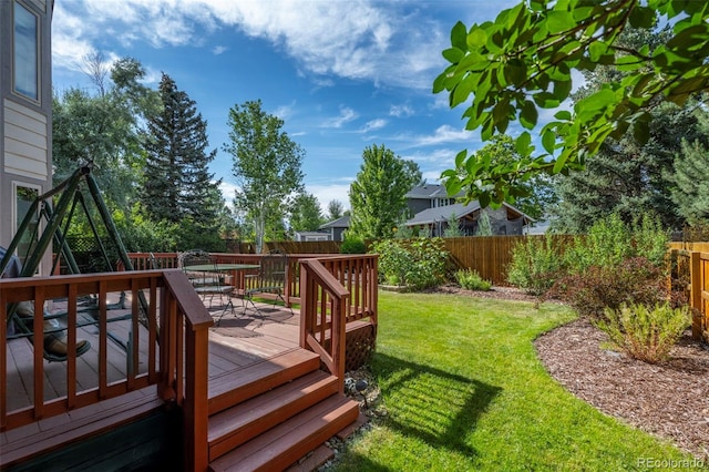 7313 Poston Way, Boulder, CO 80301 - wooden terrace featuring a fenced backyard and outdoor dining area