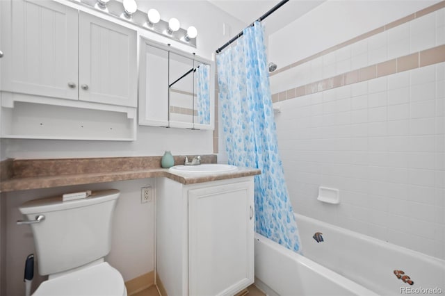 bathroom featuring shower / tub combo with curtain, vanity, and toilet