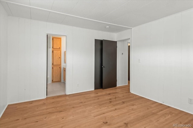 unfurnished bedroom featuring light hardwood / wood-style flooring