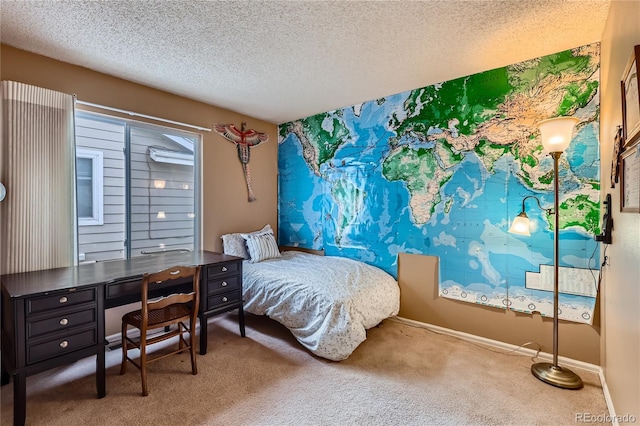 carpeted bedroom with a textured ceiling