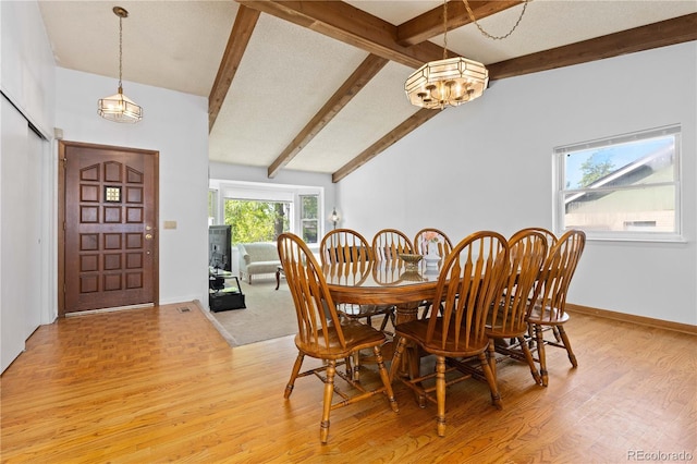 3907 E 133rd Ct, Thornton, CO 80241 - dining space with a chandelier, light wood-style flooring, and baseboards