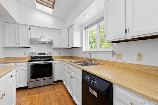 3907 E 133rd Ct, Thornton, CO 80241 - kitchen with dishwasher, stainless steel electric range oven, a sink, under cabinet range hood, and vaulted ceiling