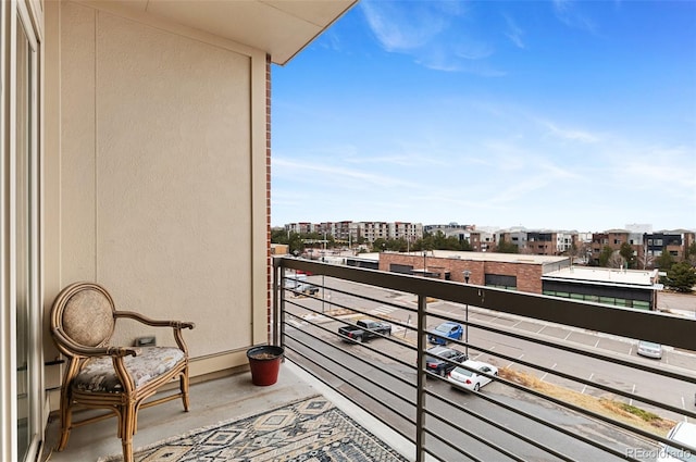 balcony featuring a view of city