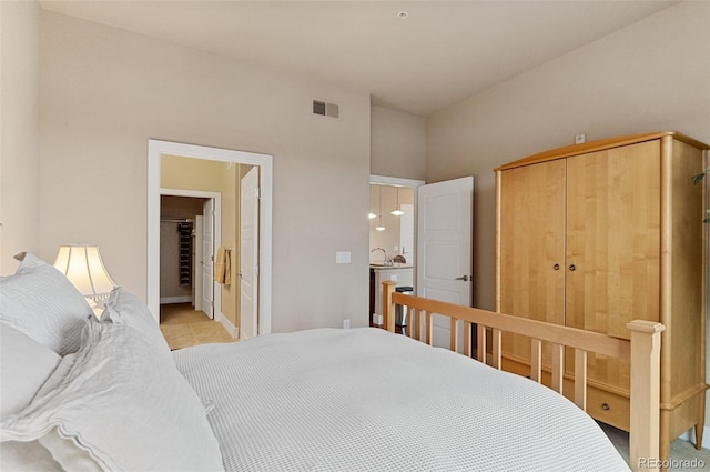 bedroom featuring visible vents