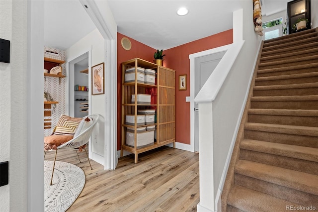 9300 E Florida Ave Unit 1202, Denver, CO 80247 - staircase with wood finished floors and baseboards