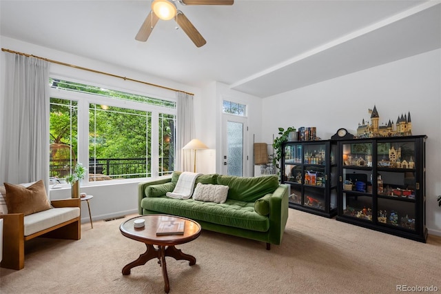 9300 E Florida Ave Unit 1202, Denver, CO 80247 - carpeted living room featuring baseboards and a ceiling fan
