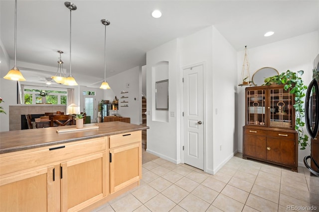 9300 E Florida Ave Unit 1202, Denver, CO 80247 - kitchen with a ceiling fan, decorative light fixtures, light tile patterned floors, light brown cabinetry, and recessed lighting