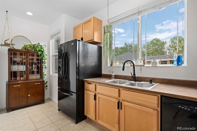 9300 E Florida Ave Unit 1202, Denver, CO 80247 - kitchen with black appliances, light brown cabinetry, and light tile patterned floors