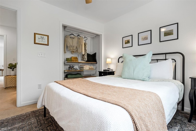 9300 E Florida Ave Unit 1202, Denver, CO 80247 - carpeted bedroom featuring baseboards and a ceiling fan