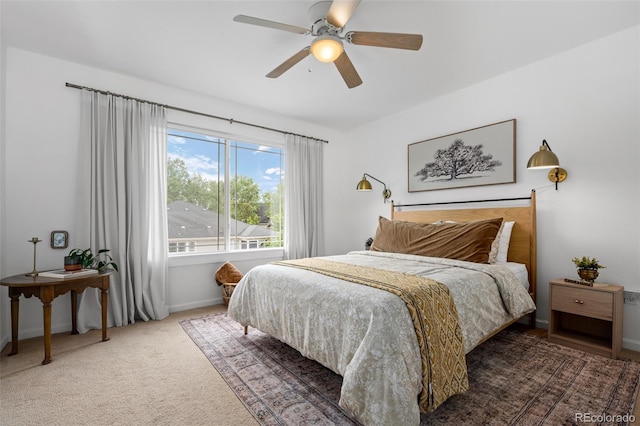 9300 E Florida Ave Unit 1202, Denver, CO 80247 - carpeted bedroom featuring baseboards and a ceiling fan