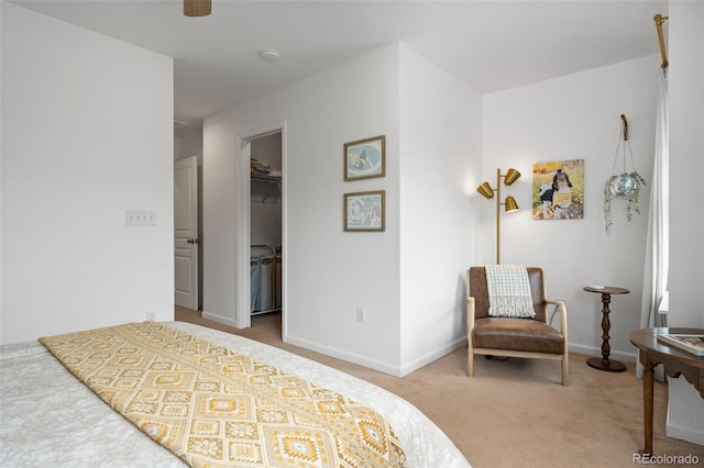 9300 E Florida Ave Unit 1202, Denver, CO 80247 - carpeted bedroom with a spacious closet and a ceiling fan