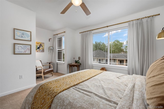 9300 E Florida Ave Unit 1202, Denver, CO 80247 - carpeted bedroom with baseboards and ceiling fan