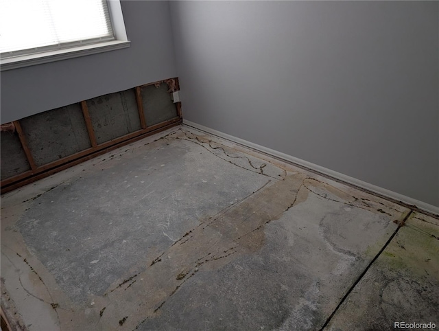 220 Mckinley Dr, Bennett, CO 80102 - unfurnished room with baseboards
