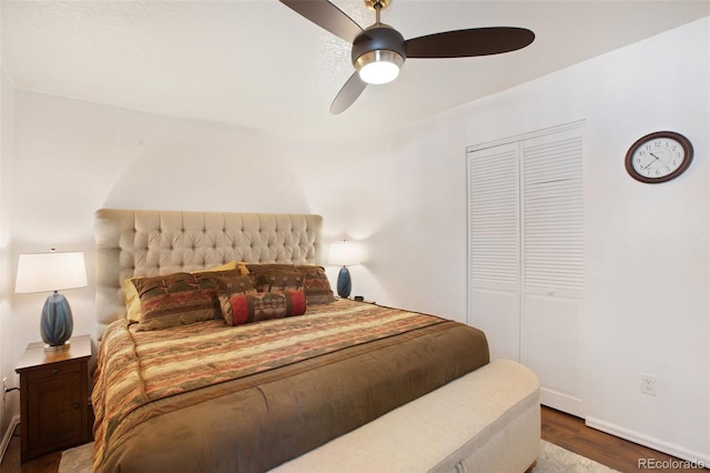 bedroom featuring a closet, ceiling fan, and hardwood / wood-style floors