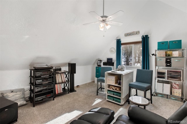 interior space featuring vaulted ceiling, ceiling fan, and light colored carpet