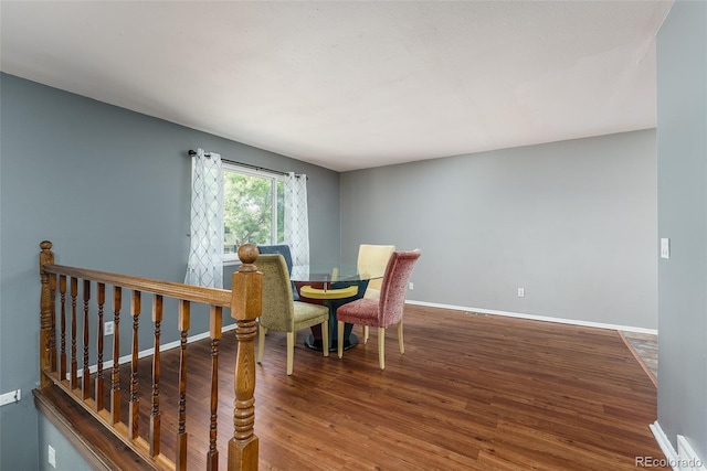 dining area featuring hardwood / wood-style floors