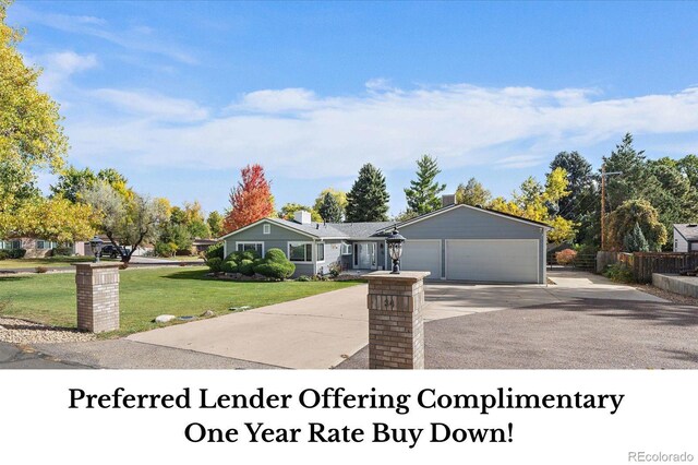 34 Skyline Dr, Wheat Ridge, CO 80215 - view of front of house with an attached garage and driveway