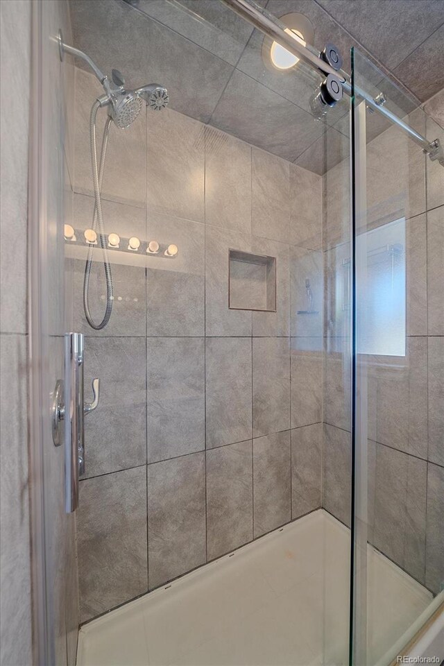 34 Skyline Dr, Wheat Ridge, CO 80215 - full bath featuring a shower stall