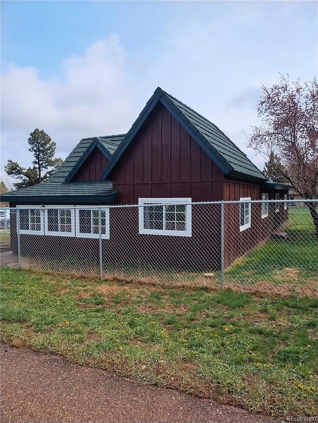 245 Lower Glenway St, Palmer Lake, CO 80133 - view of side of home with board and batten siding