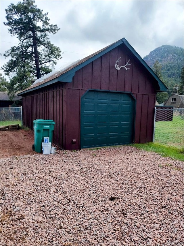 245 Lower Glenway St, Palmer Lake, CO 80133 - detached garage with driveway and a mountain view