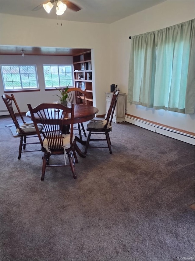 245 Lower Glenway St, Palmer Lake, CO 80133 - carpeted dining area featuring a baseboard heating unit and a ceiling fan
