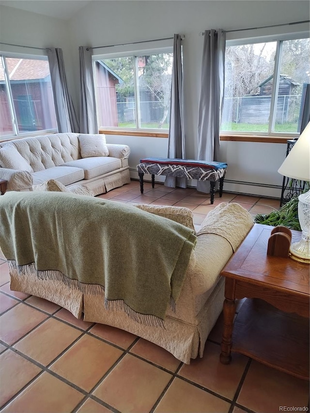245 Lower Glenway St, Palmer Lake, CO 80133 - living room with healthy amount of natural light and tile patterned flooring