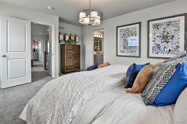 834 N Bently St, Watkins, CO 80137 - carpeted bedroom with a chandelier, ensuite bath, and baseboards