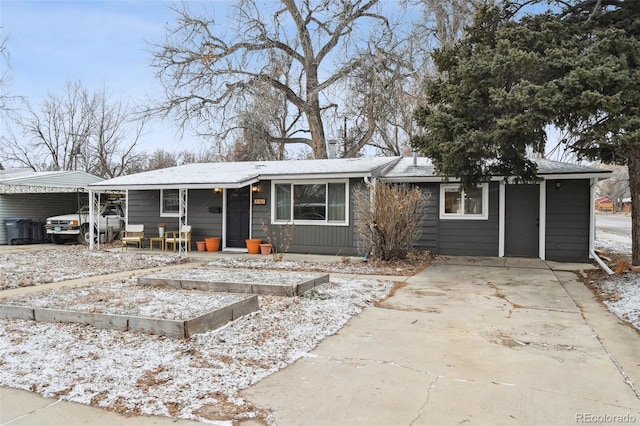 ranch-style house with a carport