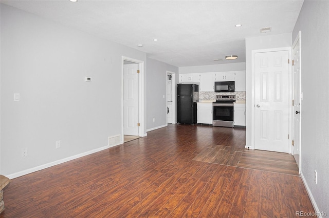 3600 S Pierce St Unit 2-201, Lakewood, CO 80235 - unfurnished living room with dark wood-style floors and recessed lighting