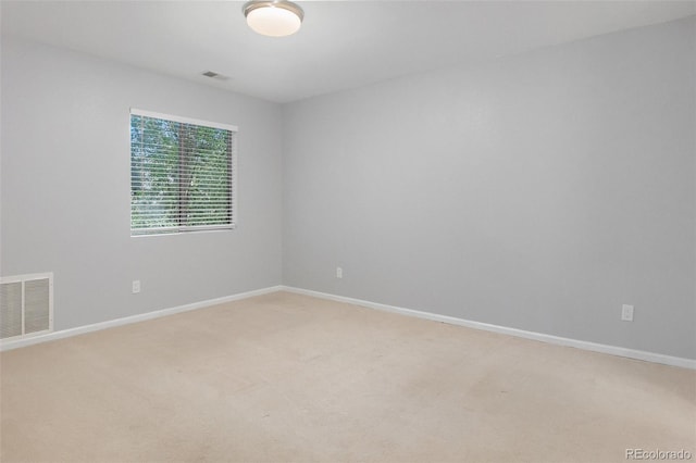 3600 S Pierce St Unit 2-201, Lakewood, CO 80235 - unfurnished room with light carpet and baseboards