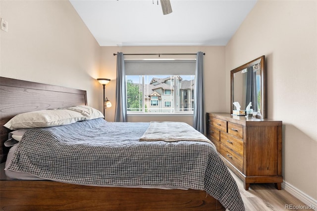 8779 S Kipling Way Unit 204, Littleton, CO 80127 - bedroom featuring baseboards, wood finished floors, and ceiling fan