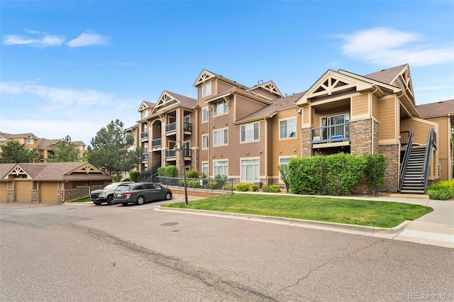 8779 S Kipling Way Unit 204, Littleton, CO 80127 - view of building exterior with stairway