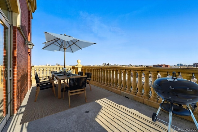 1950 N Logan St Unit 1109, Denver, CO 80203 - view of patio / terrace featuring area for grilling, outdoor dining area, and a balcony
