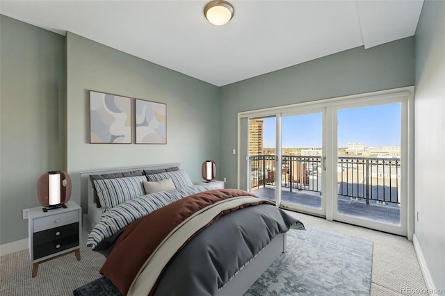 1950 N Logan St Unit 1109, Denver, CO 80203 - bedroom with carpet, access to exterior, and baseboards