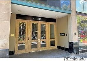 720 16th St Unit 513, Denver, CO 80202 - entrance to property featuring french doors and stucco siding