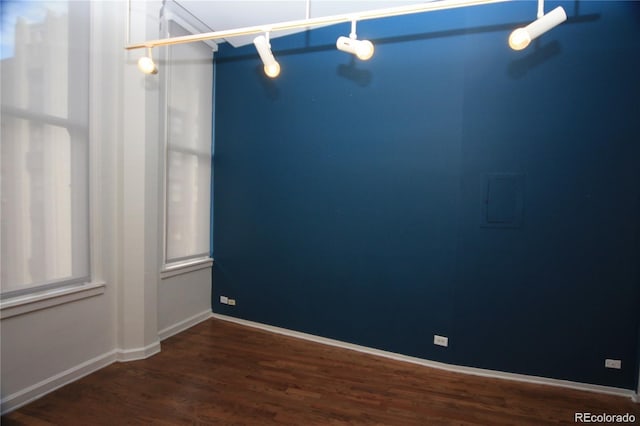 720 16th St Unit 513, Denver, CO 80202 - unfurnished room with dark wood-style floors and healthy amount of natural light