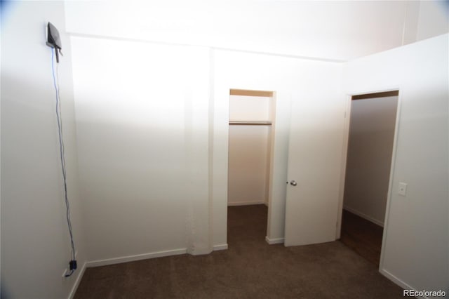 720 16th St Unit 513, Denver, CO 80202 - hallway featuring carpet and baseboards
