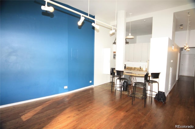 720 16th St Unit 513, Denver, CO 80202 - dining area with wood finished floors and a towering ceiling