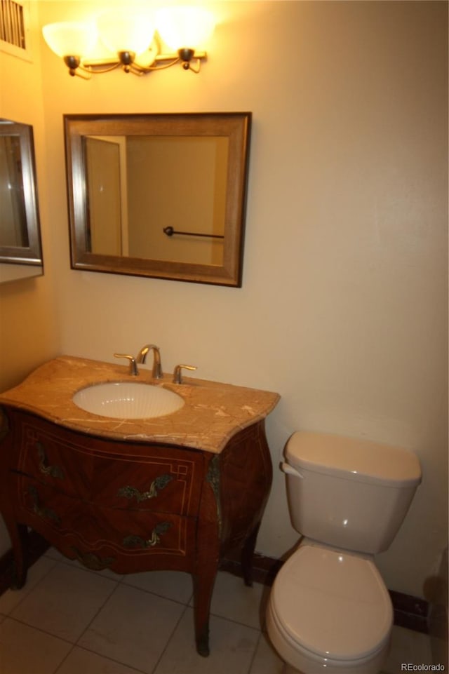720 16th St Unit 513, Denver, CO 80202 - half bathroom featuring vanity and tile patterned flooring