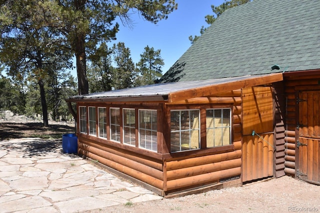 988 15th Trl, Cotopaxi, CO 81223 - back of property with faux log siding and roof with shingles