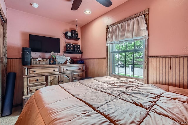 5704 Ammons St, Arvada, CO 80002 - bedroom with a wainscoted wall, wood walls, carpet floors, and ceiling fan