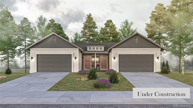 view of front facade with a front lawn and a garage