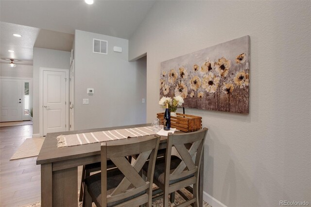 dining room with hardwood / wood-style flooring