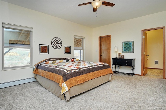 bedroom featuring ceiling fan, light carpet, a baseboard heating unit, visible vents, and baseboards