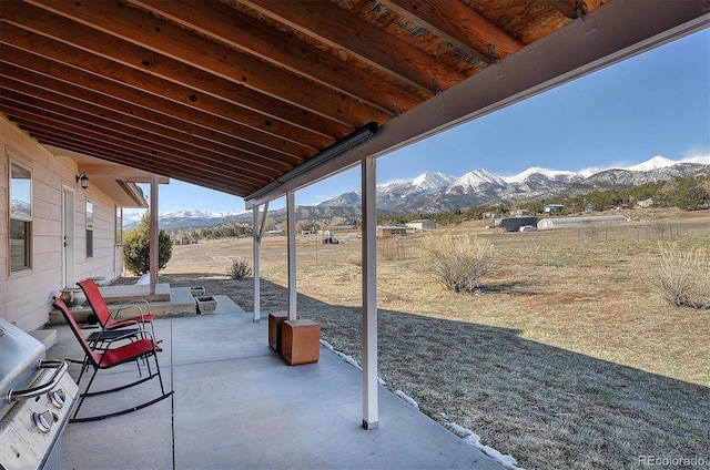 view of patio featuring a mountain view