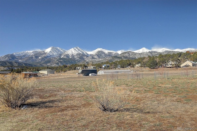 view of mountain feature with a rural view