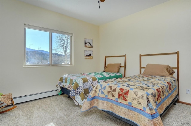 42 Holiday Hills Blvd, Howard, CO 81233 - bedroom with carpet flooring, a ceiling fan, and a baseboard heating unit