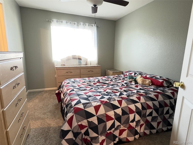 bedroom featuring carpet flooring and a ceiling fan
